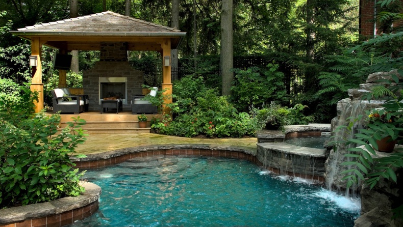 Gib San Freeform pool with grotto